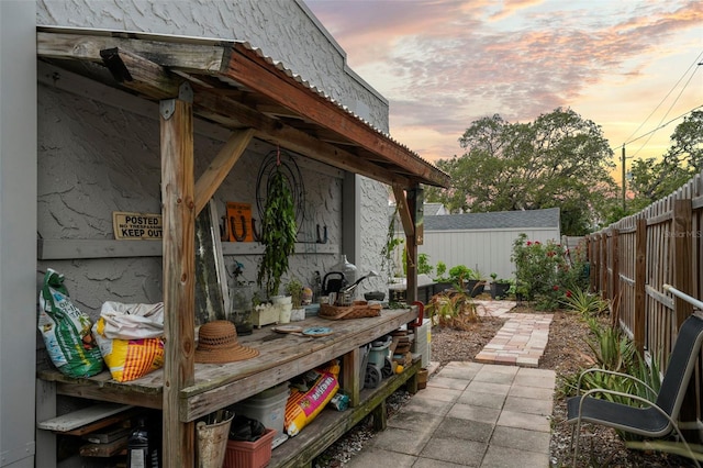 6251 4th Ave S, Saint Petersburg, FL 33707 - fenced backyard featuring a patio