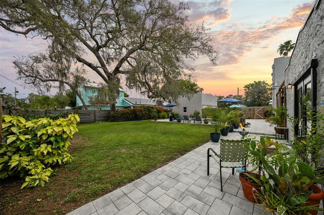 6251 4th Ave S, Saint Petersburg, FL 33707 - view of yard featuring a patio area