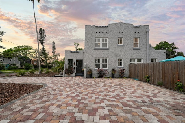 6251 4th Ave S, Saint Petersburg, FL 33707 - back of house at dusk with driveway