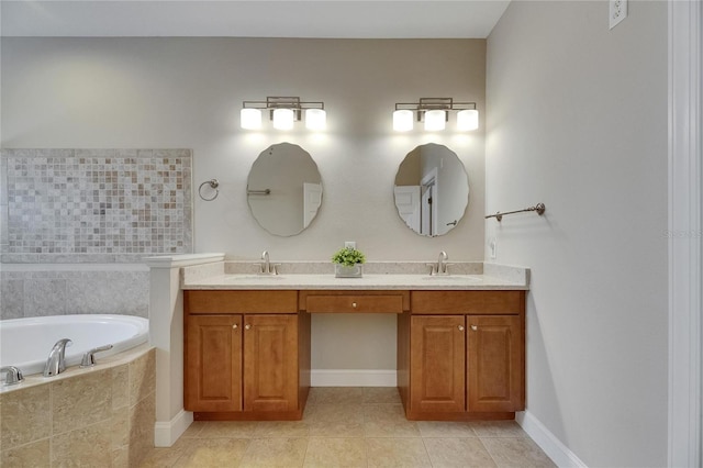 110 Aberdeen Pond Dr, Apollo Beach, FL 33572 - bathroom with double vanity, a bath, tile patterned flooring, and baseboards