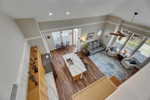 110 Aberdeen Pond Dr, Apollo Beach, FL 33572 - living room featuring plenty of natural light, wood finished floors, lofted ceiling, recessed lighting, and ceiling fan