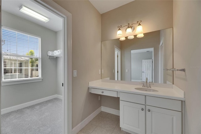 110 Aberdeen Pond Dr, Apollo Beach, FL 33572 - bathroom with vanity, baseboards, and tile patterned floors