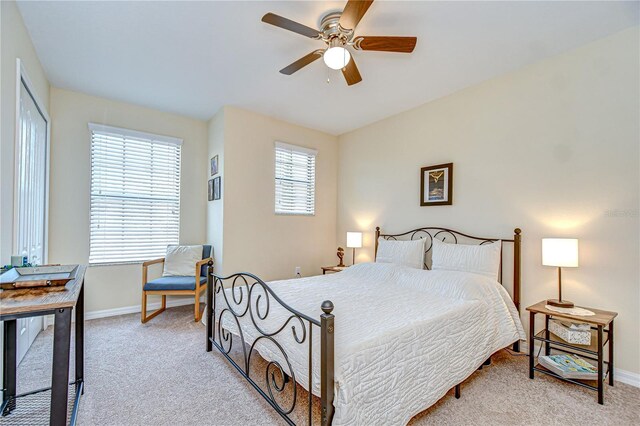 2723 Garden Falls Dr, Brandon, FL 33511 - carpeted bedroom featuring baseboards and a ceiling fan