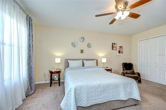 2723 Garden Falls Dr, Brandon, FL 33511 - carpeted bedroom with a closet, baseboards, and ceiling fan