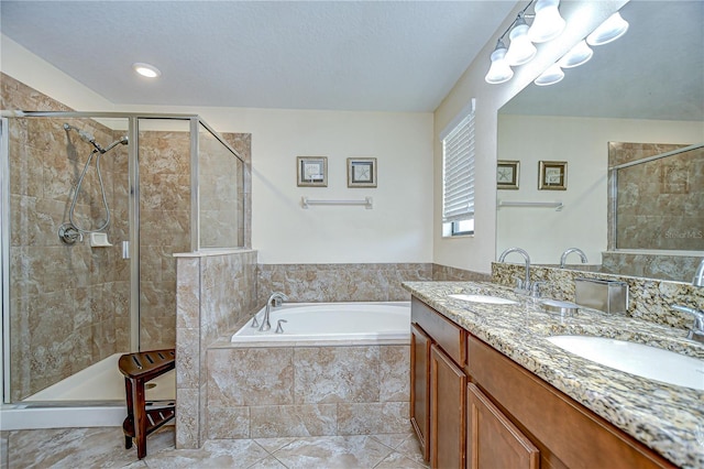 2723 Garden Falls Dr, Brandon, FL 33511 - full bathroom featuring a stall shower, a bath, and double vanity