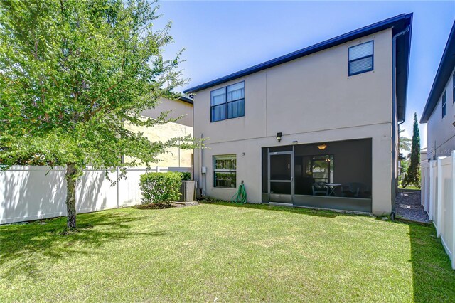 2723 Garden Falls Dr, Brandon, FL 33511 - rear view of house with stucco siding and central AC unit