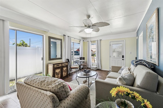 13920 Berkowitz Ave, Hudson, FL 34667 - living area with ceiling fan, baseboards, and wood finished floors