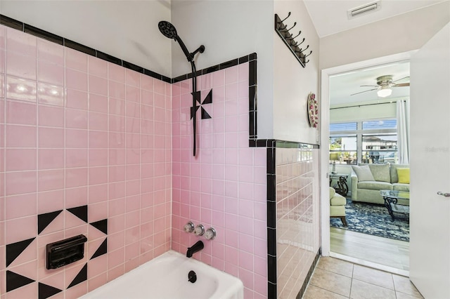 13920 Berkowitz Ave, Hudson, FL 34667 - full bath featuring bathtub / shower combination, tile patterned flooring, and a ceiling fan