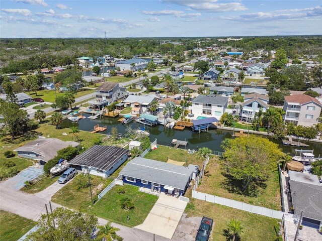 13920 Berkowitz Ave, Hudson, FL 34667 - aerial view of residential area featuring a large body of water