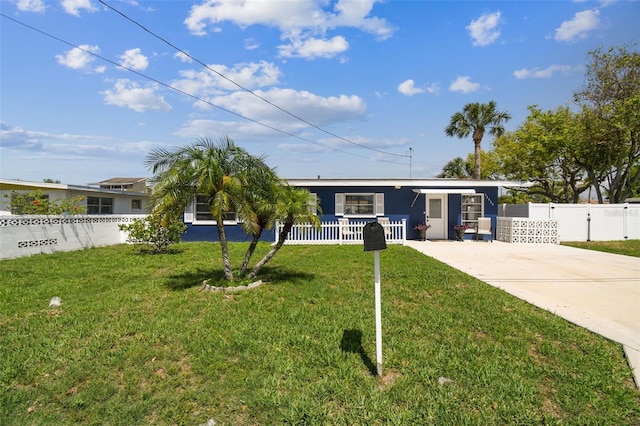 13920 Berkowitz Ave, Hudson, FL 34667 - single story home featuring concrete driveway and a gate