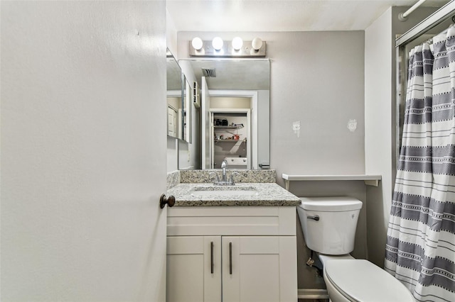 39650 US Highway 19 N Unit 143, Tarpon Springs, FL 34689 - full bathroom with toilet, vanity, and curtained shower