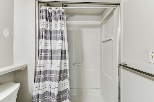 39650 US Highway 19 N Unit 143, Tarpon Springs, FL 34689 - full bathroom with a shower with shower curtain and toilet