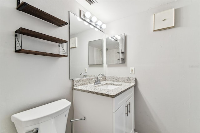 39650 US Highway 19 N Unit 143, Tarpon Springs, FL 34689 - bathroom featuring vanity and toilet