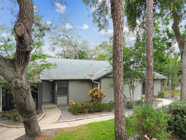 39650 US Highway 19 N Unit 143, Tarpon Springs, FL 34689 - view of front facade with a shingled roof