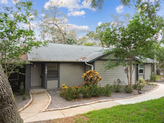 39650 US Highway 19 N Unit 143, Tarpon Springs, FL 34689 - view of front facade with a shingled roof