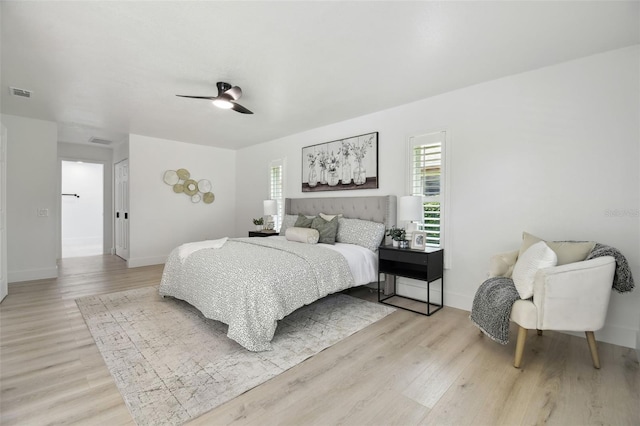 14170 Fennsbury Dr, Tampa, FL 33624 - bedroom with light wood-style floors, baseboards, and ceiling fan