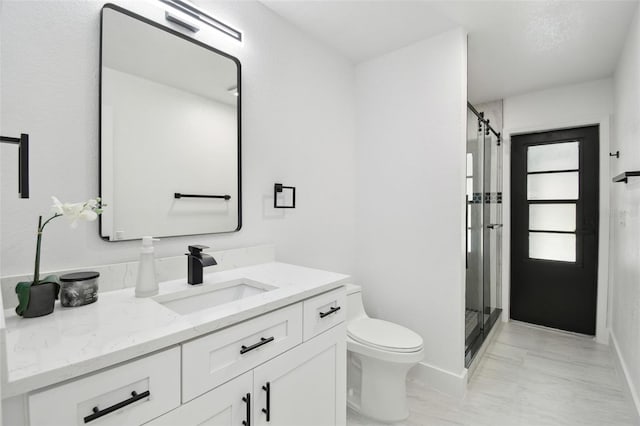 14170 Fennsbury Dr, Tampa, FL 33624 - full bath featuring toilet, vanity, a shower stall, and baseboards