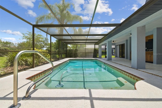 14170 Fennsbury Dr, Tampa, FL 33624 - swimming pool featuring a patio and glass enclosure
