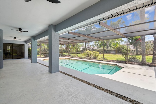 14170 Fennsbury Dr, Tampa, FL 33624 - swimming pool featuring a ceiling fan, a patio, and a yard