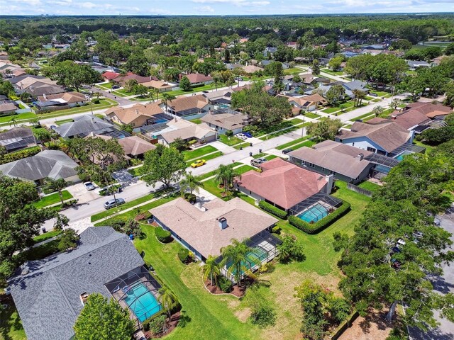 14170 Fennsbury Dr, Tampa, FL 33624 - aerial view of property's location with nearby suburban area and a pool area