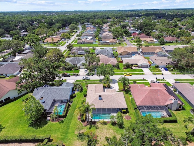 14170 Fennsbury Dr, Tampa, FL 33624 - aerial overview of property's location with a pool area and nearby suburban area