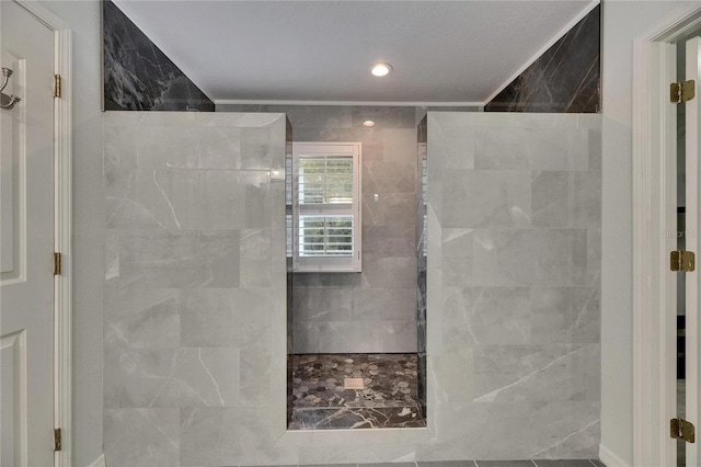 bathroom featuring a walk in shower and recessed lighting
