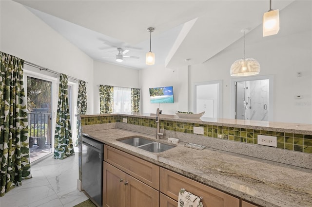 1010 Central Ave Unit 227, Saint Petersburg, FL 33705 - kitchen featuring stainless steel dishwasher, a sink, light stone countertops, light marble finish flooring, and decorative light fixtures