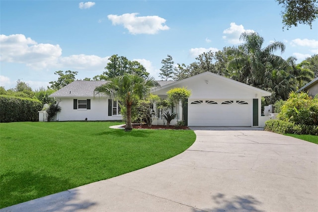 71 Flamingo Cir, Safety Harbor, FL 34695 - single story home featuring driveway, a garage, and a front yard