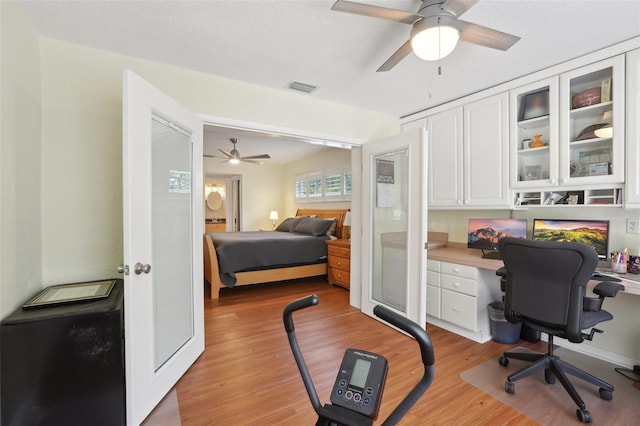 71 Flamingo Cir, Safety Harbor, FL 34695 - bedroom featuring light wood-style floors and ceiling fan