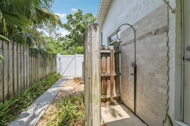 71 Flamingo Cir, Safety Harbor, FL 34695 - view of yard with a gate