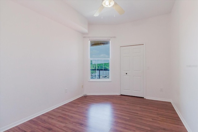 18107 Peregrines Perch Pl Unit 6303, Lutz, FL 33558 - empty room featuring ceiling fan, wood finished floors, and baseboards