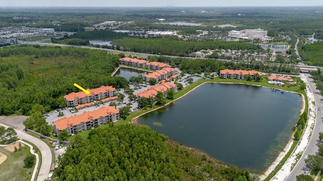 18107 Peregrines Perch Pl Unit 6303, Lutz, FL 33558 - aerial view of property's location with a nearby body of water and a forest