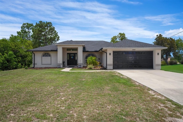 1854 S Overview Dr, Lecanto, FL 34461 - view of front of home with a garage, stucco siding, concrete driveway, and a front yard