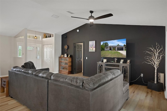 1854 S Overview Dr, Lecanto, FL 34461 - living room featuring light wood-style flooring, a ceiling fan, baseboards, and high vaulted ceiling