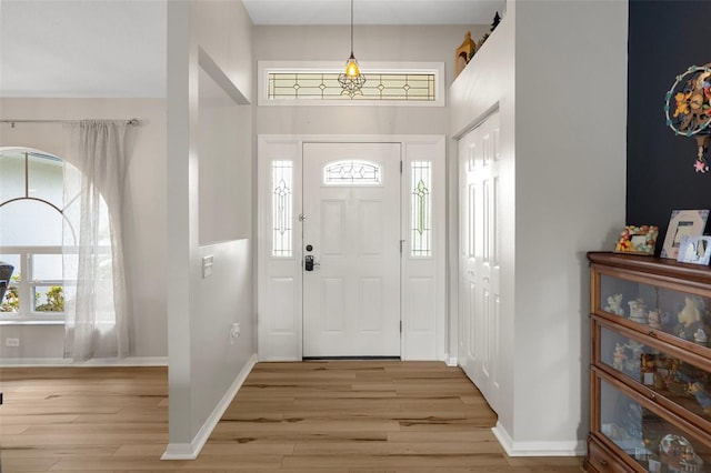 1854 S Overview Dr, Lecanto, FL 34461 - foyer entrance featuring light wood finished floors and baseboards