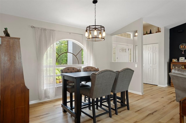 1854 S Overview Dr, Lecanto, FL 34461 - dining room with light wood finished floors, a chandelier, and baseboards