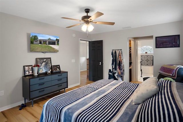 1854 S Overview Dr, Lecanto, FL 34461 - bedroom featuring light wood-style flooring, baseboards, and ceiling fan