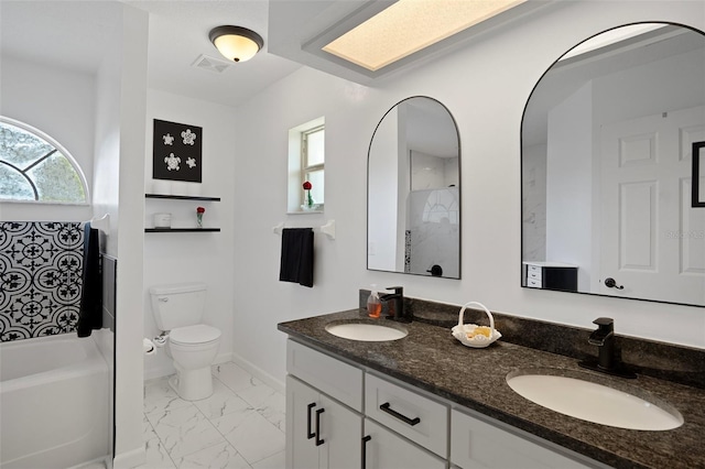 1854 S Overview Dr, Lecanto, FL 34461 - full bath with plenty of natural light, marble look tiles, toilet, and a shower