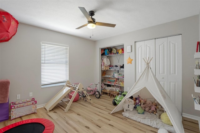 1854 S Overview Dr, Lecanto, FL 34461 - recreation room with wood finished floors, a ceiling fan, and baseboards