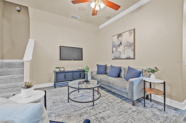 215 S Westland Ave Unit 3, Tampa, FL 33606 - living area with baseboards, wood finished floors, a ceiling fan, crown molding, and stairs