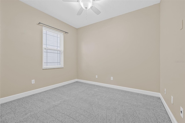 215 S Westland Ave Unit 3, Tampa, FL 33606 - empty room with carpet floors, a ceiling fan, and baseboards