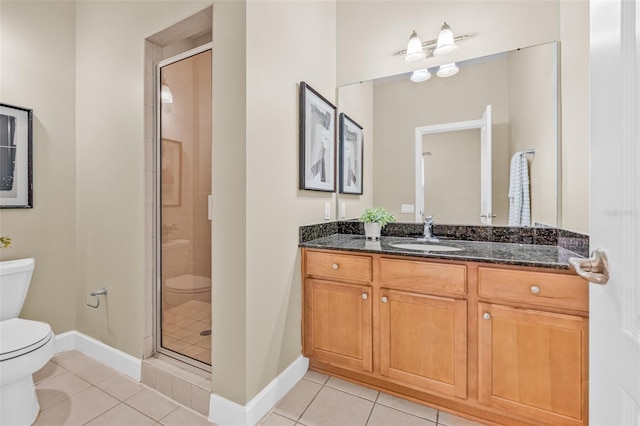 215 S Westland Ave Unit 3, Tampa, FL 33606 - bathroom featuring toilet, tile patterned floors, and a stall shower