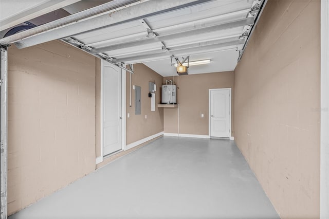 215 S Westland Ave Unit 3, Tampa, FL 33606 - garage featuring electric panel and water heater