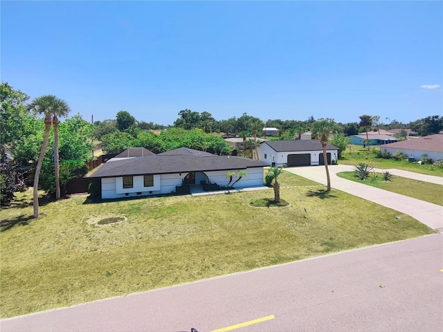 20295 Lorenzo Ave, Port Charlotte, FL 33952 - ranch-style house with concrete driveway, a front lawn, and a garage