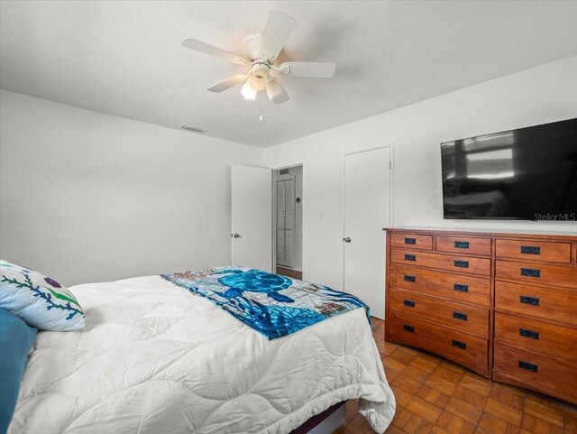 4005 W Coachman Ave, Tampa, FL 33611 - bedroom with a ceiling fan