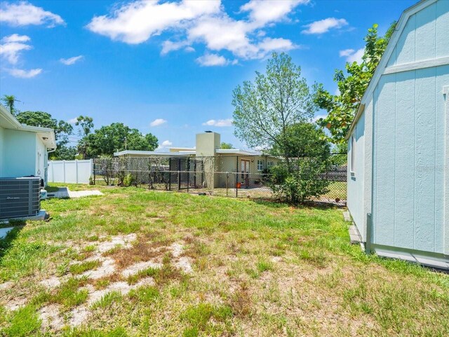4005 W Coachman Ave, Tampa, FL 33611 - view of yard featuring central air condition unit