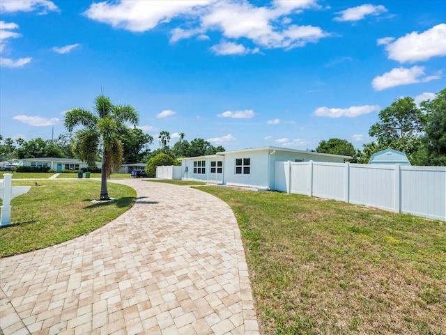 4005 W Coachman Ave, Tampa, FL 33611 - back of property with decorative driveway
