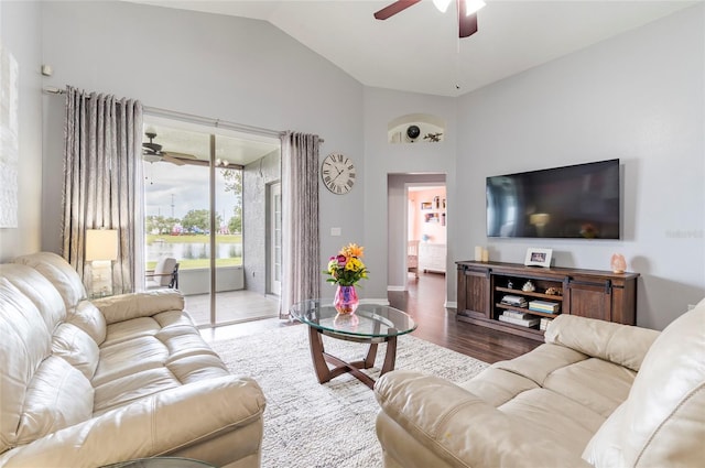 10811 Lakeside Vista Dr, Riverview, FL 33569 - living area featuring ceiling fan, vaulted ceiling, wood finished floors, and baseboards