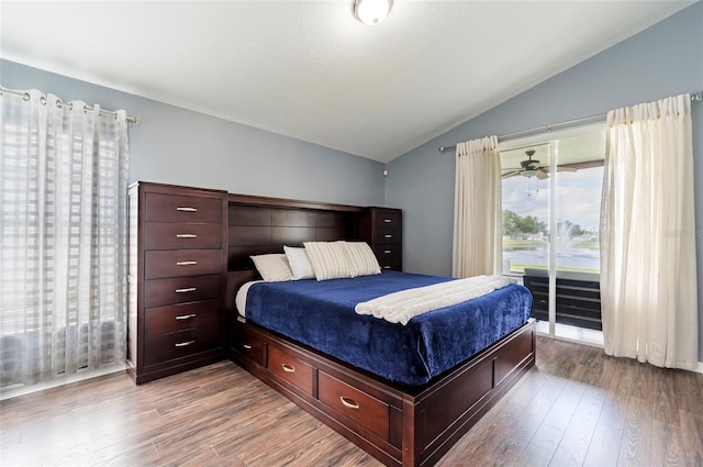 10811 Lakeside Vista Dr, Riverview, FL 33569 - bedroom with vaulted ceiling, access to outside, and light wood-style floors