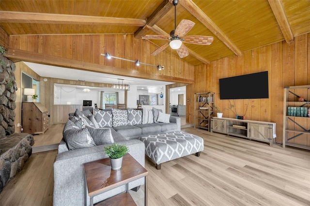 525 Gornto Lake Rd, Brandon, FL 33510 - living room with wooden ceiling with exposed beams, wood walls, wood finished floors, ceiling fan, and high vaulted ceiling